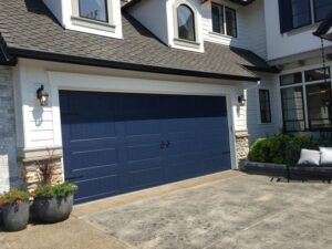 Modern navy blue garage door installed by Charleston Garage Door LLC in Charleston SC